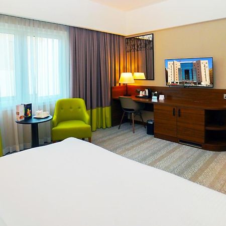 The Grand Lux Hotel Ντόχα Εξωτερικό φωτογραφία A room at the hotel