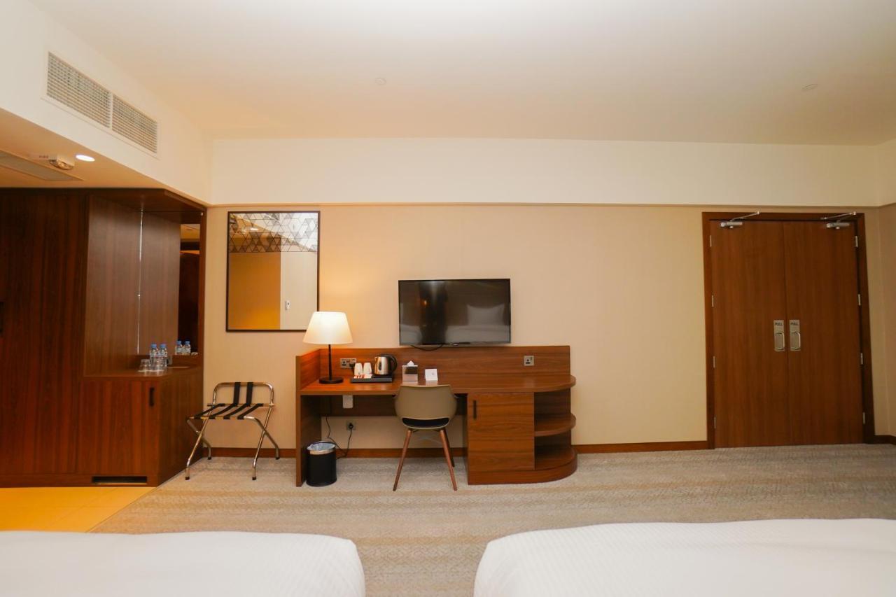 The Grand Lux Hotel Ντόχα Εξωτερικό φωτογραφία A room at the hotel