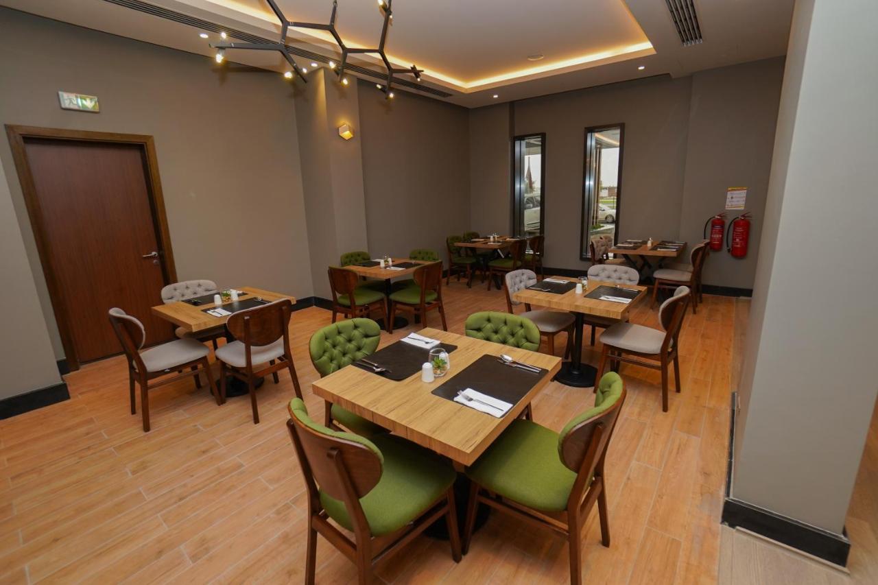 The Grand Lux Hotel Ντόχα Εξωτερικό φωτογραφία The restaurant