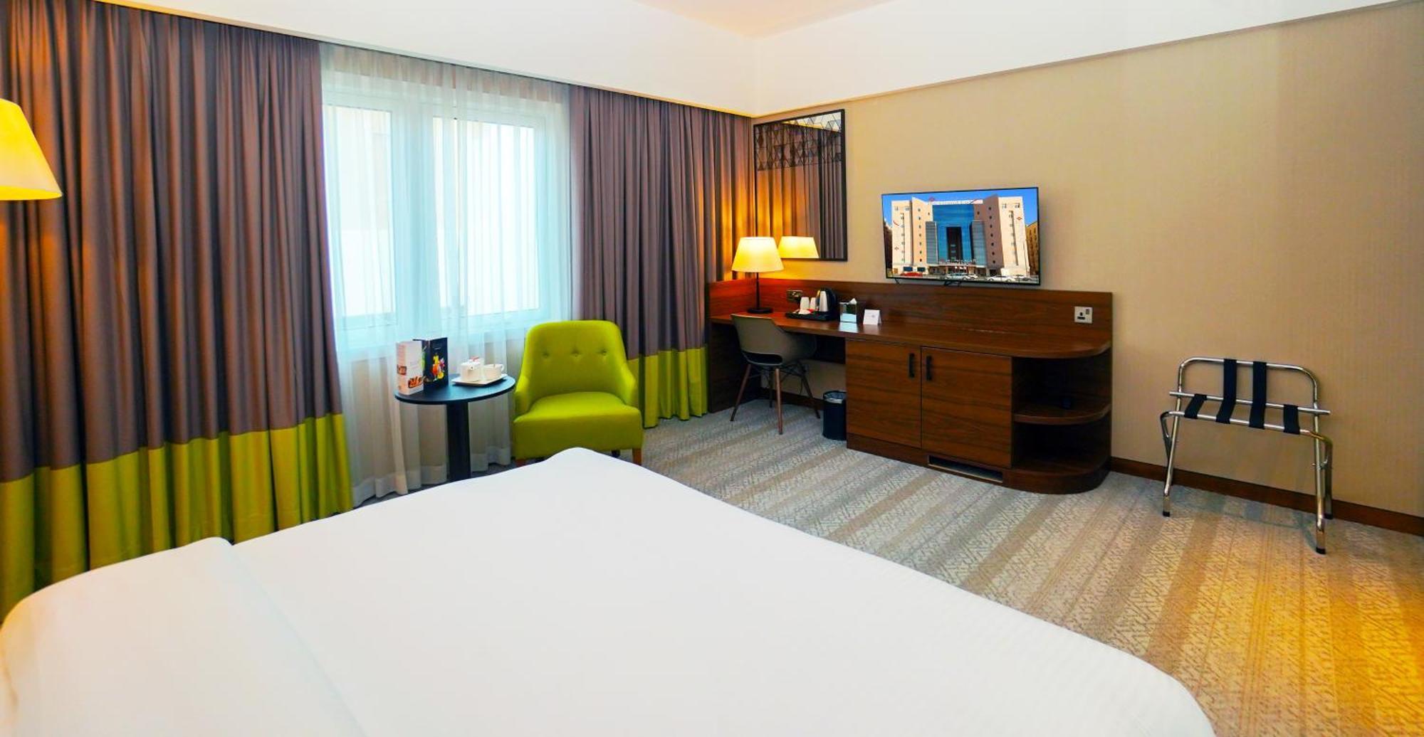 The Grand Lux Hotel Ντόχα Εξωτερικό φωτογραφία A room at the hotel